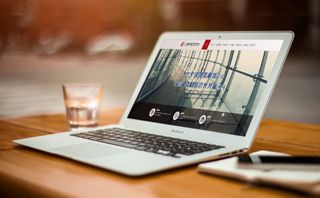 What are the applications of wear-resistant steel NM400 in the building materials industry